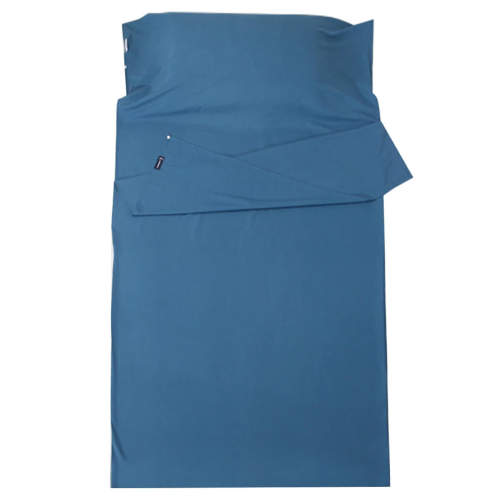 Blue sleeping pad with a pillow on a white background