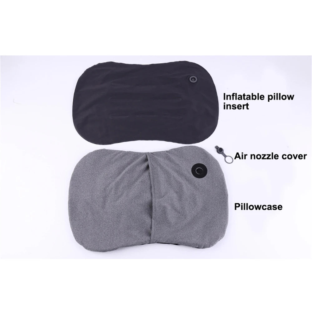 Gray inflatable pillow with black air nozzle cover on a white background