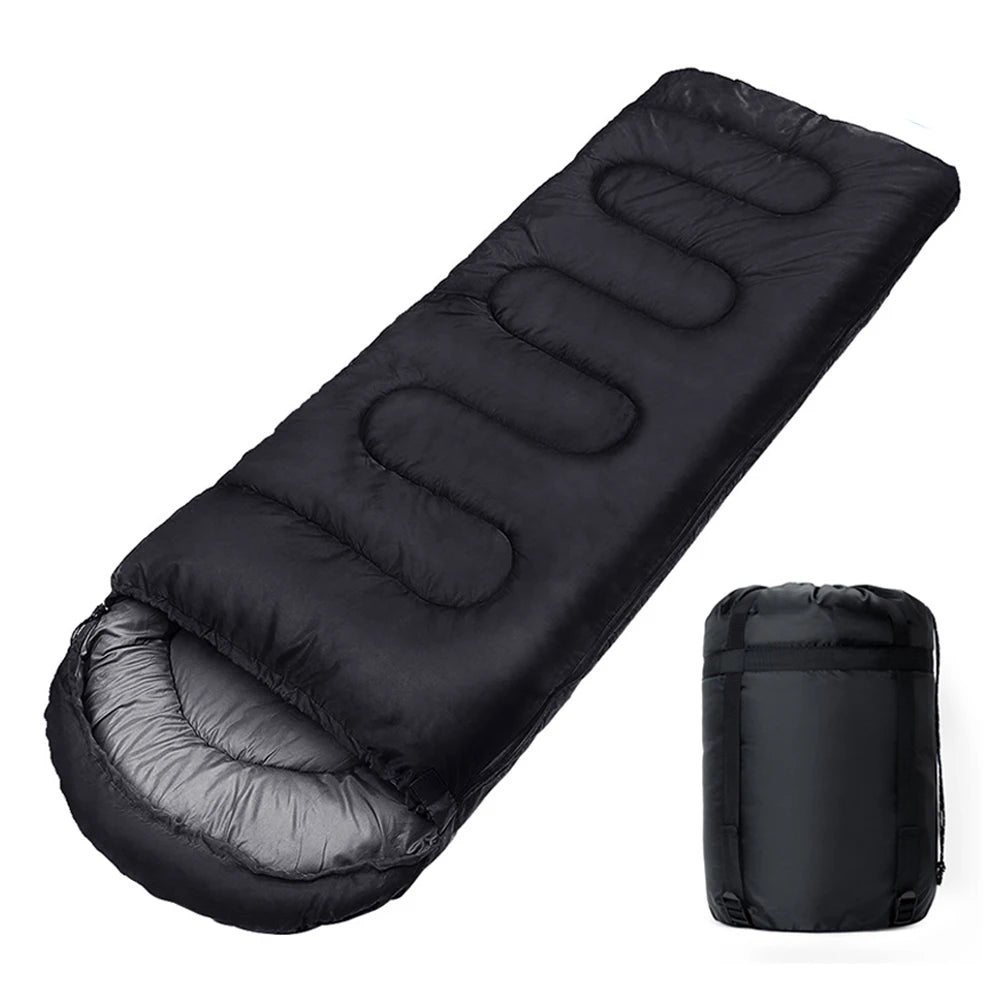 Black sleeping bag with its compressed version on a white background