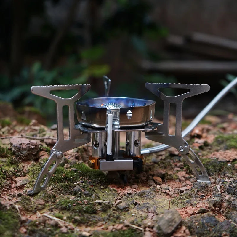 Portable camping stove on a natural outdoor background