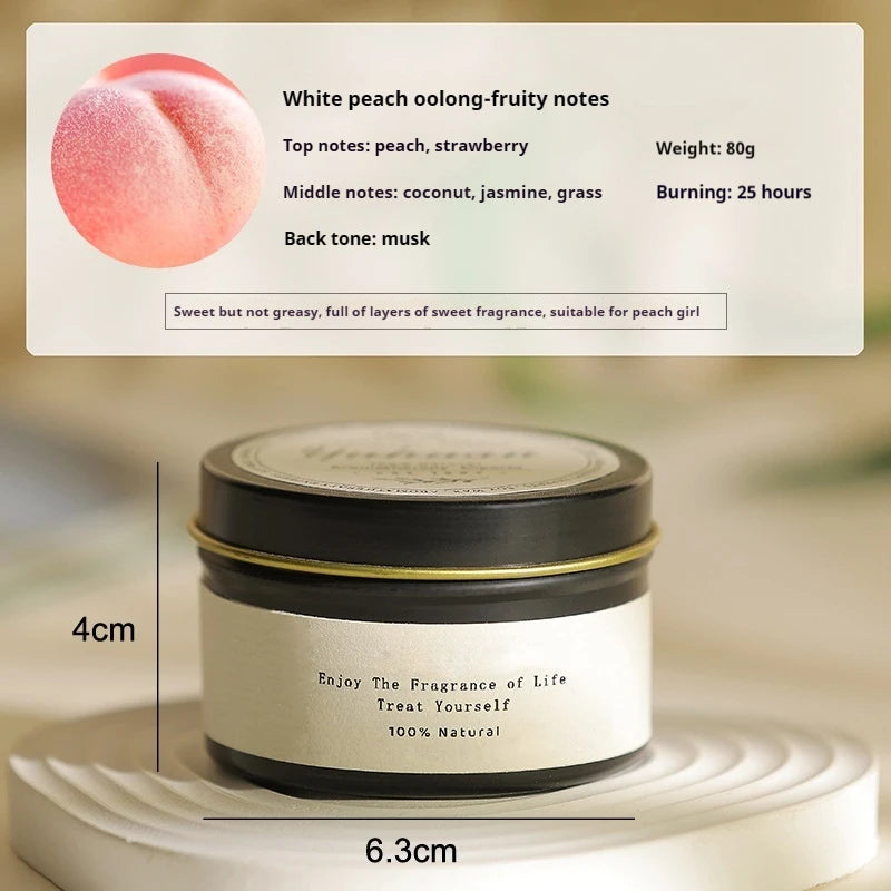 Candle jar with label detailing fragrance notes and characteristics on a blurred background