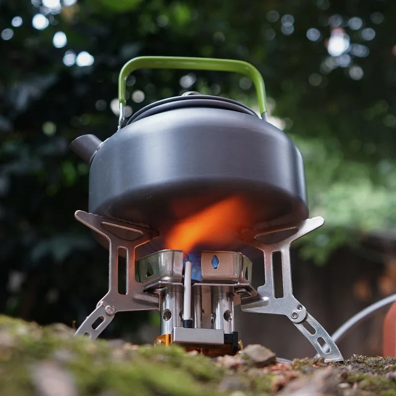 Portable stove with a kettle on a natural background