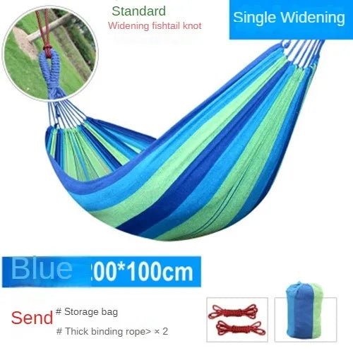 Blue and green striped hammock with widening feature and accessories on a white background