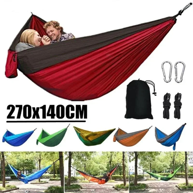 Red and black hammock with accessories on a white background, featuring size 270x140CM.