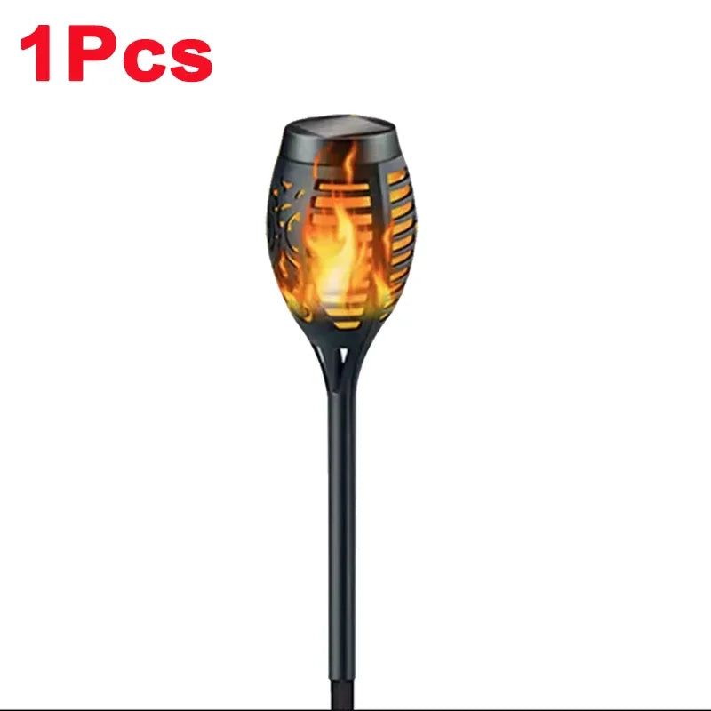 Solar garden light with flame design on a white background