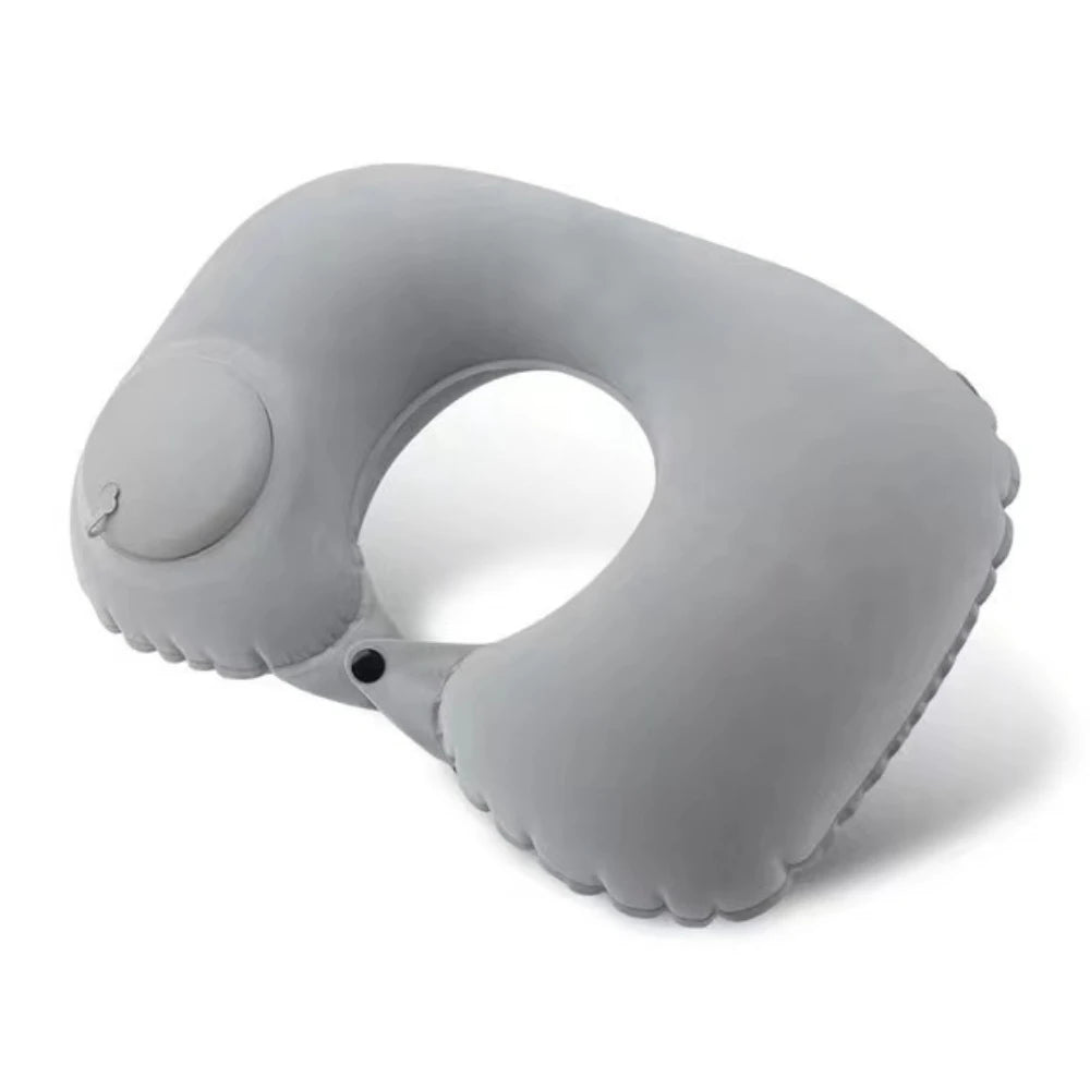 Gray inflatable travel pillow on a white background