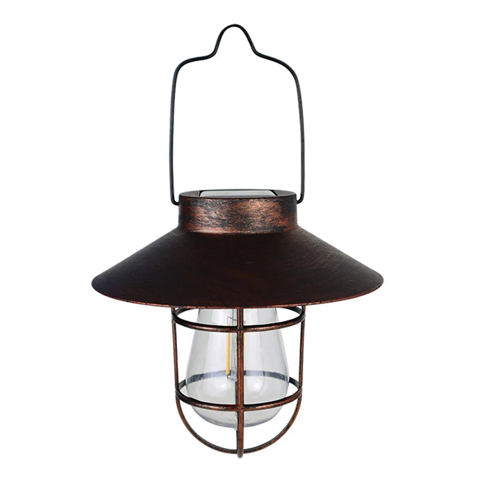 Decorative hanging lantern with a metal design on a white background