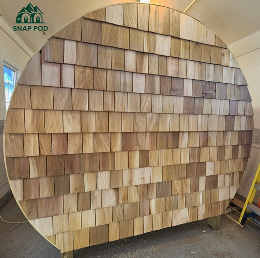 Revealing SnapPod’s New Cedar Shingle Rear Wall: Traditional Craftsmanship Meets Curved Woodland Magic