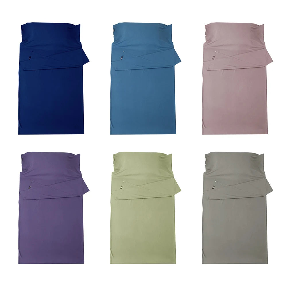 Set of six folded fabrics in different colors on a white background