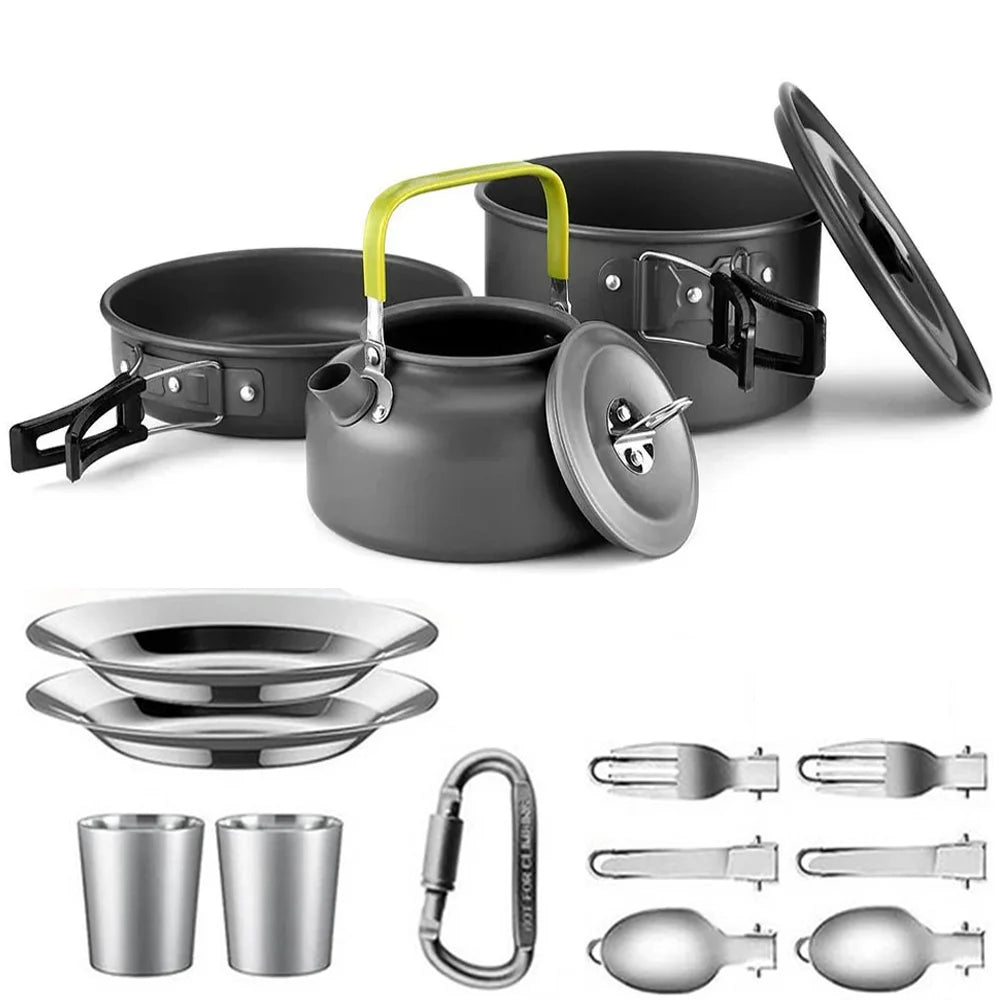 Collection of camping cookware including pots, pans, a kettle, plates, cups, utensils, and a carabiner on a white background.