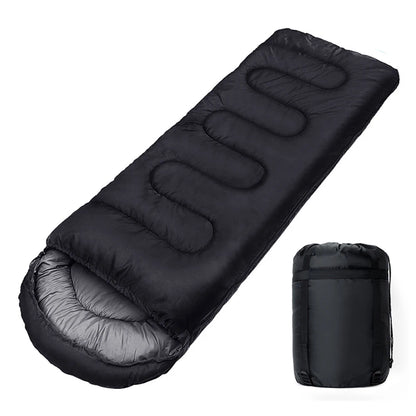 Black sleeping bag with its compressed version on a white background