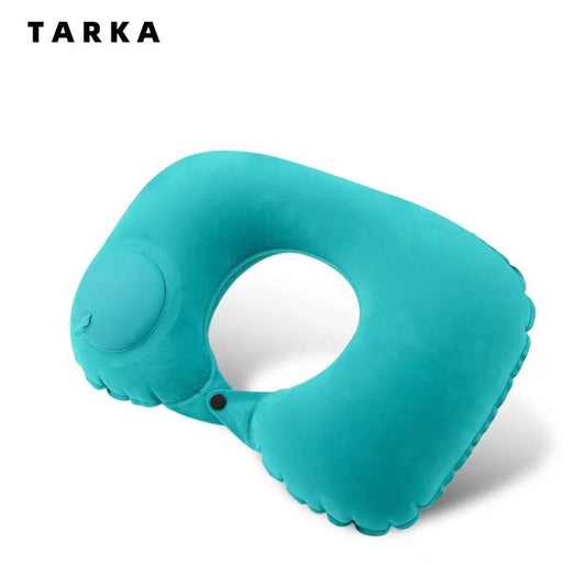 Turquoise inflatable travel pillow on a white background with 'TARKA' branding.