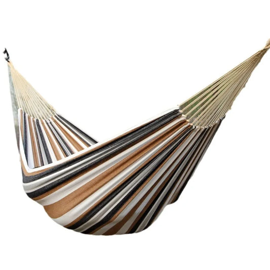 Striped hammock with brown, beige, and black pattern on a white background
