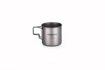 Silver camping mug with 'Pacsafe' branding on a white background