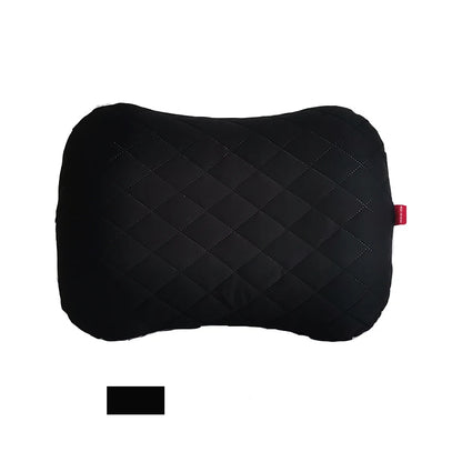 Black quilted travel pillow on a white background