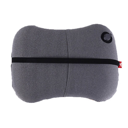 Gray travel pillow with black strap and red tag on a white background