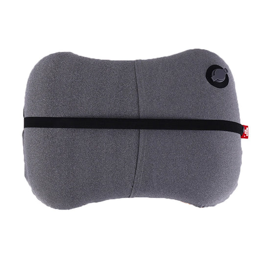 Gray travel pillow with black strap and red tag on a white background