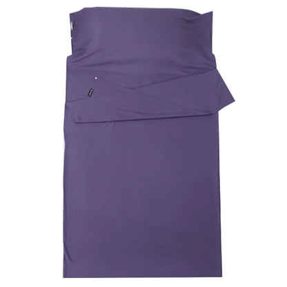 Purple bed sheet set with a fitted sheet and flat sheet on a white background