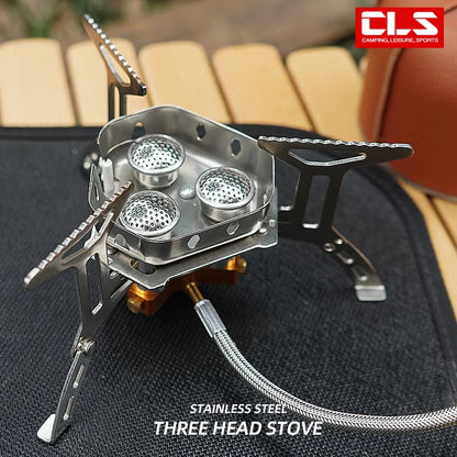 Three-head camping stove with CLS branding on a blurred background